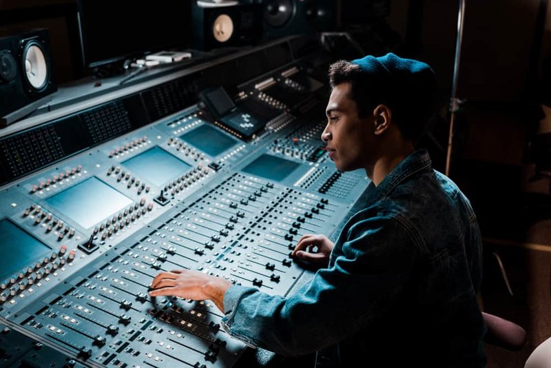 Music producer working with plugins